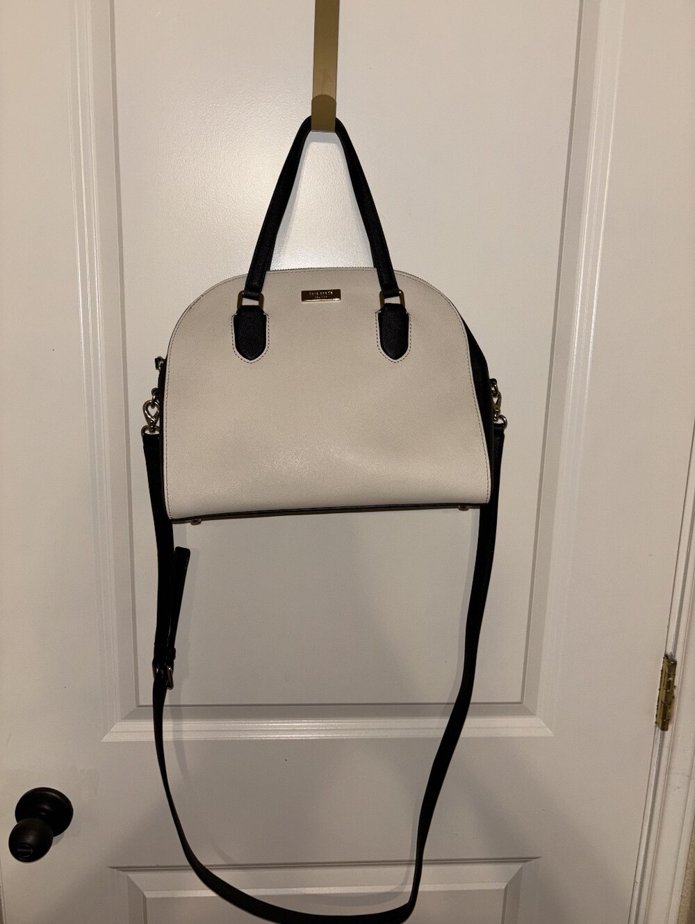 kate spade Cream Satchel with Black Handles and Gold Plaque